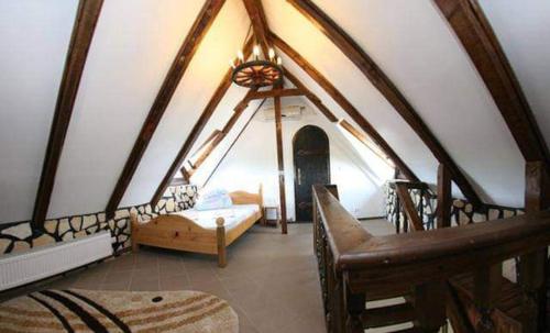 a room with a tent with a bed in it at Casa cu flori Murighiol in Murighiol