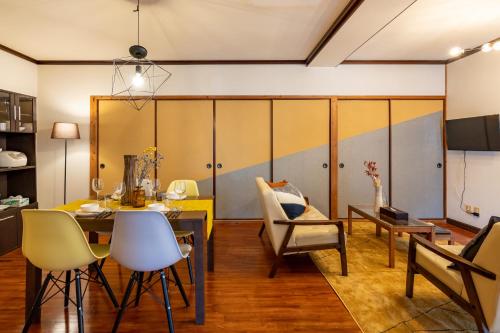 Μια τηλεόραση ή/και κέντρο ψυχαγωγίας στο Type B Room 63平米 -ウル エスポワール石垣-