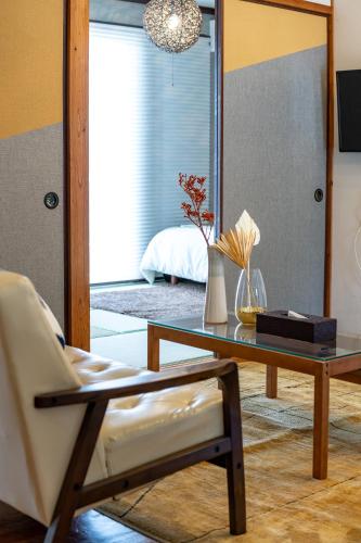 Μια τηλεόραση ή/και κέντρο ψυχαγωγίας στο Type B Room 63平米 -ウル エスポワール石垣-