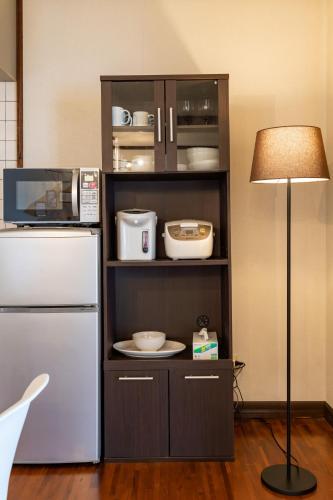 Η κουζίνα ή μικρή κουζίνα στο Type B Room 63平米 -ウル エスポワール石垣-