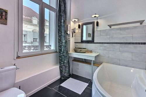 Koupelna v ubytování Les Appartements Fénelon