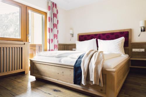 Postel nebo postele na pokoji v ubytování Hotel Jägerhof