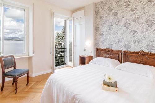 Postel nebo postele na pokoji v ubytování Hotel Aganoor