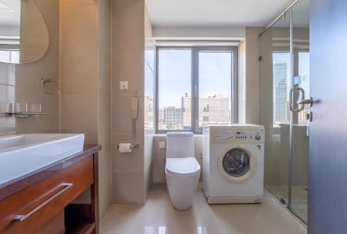 Vonios kambarys apgyvendinimo įstaigoje Qingdao Housing International Hotel
