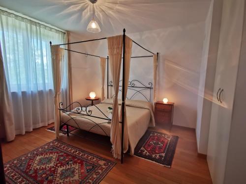 Кровать или кровати в номере Villa Ulivo