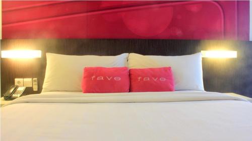 Katil atau katil-katil dalam bilik di favehotel Pluit Junction