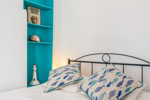 Postel nebo postele na pokoji v ubytování Aquanis Milos Apartments