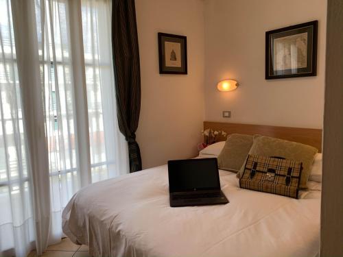 Postel nebo postele na pokoji v ubytování Hotel La Bitta