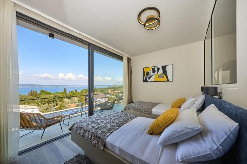 Posteľ alebo postele v izbe v ubytovaní Villa Sunlight