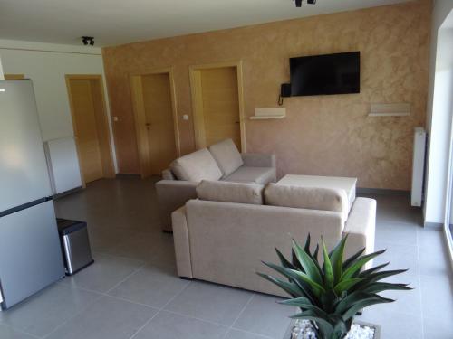 Televisyen dan/atau pusat hiburan di Relax Center Olimian