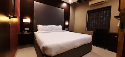 Postel nebo postele na pokoji v ubytování Leisure Stays - Premium Suites