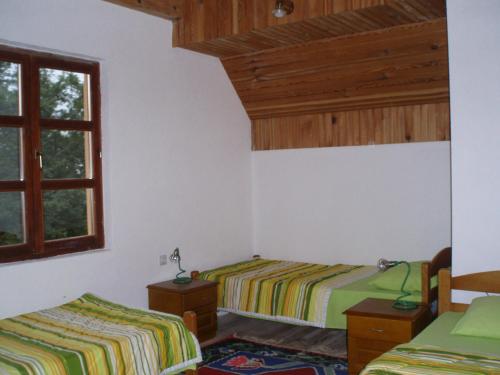 Katil atau katil-katil dalam bilik di Guest House Tara Canyon