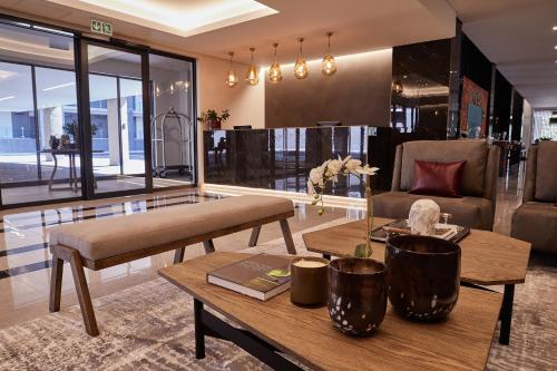 The Catalyst Apartment Hotel by NEWMARK tesisinde lobi veya resepsiyon alanı