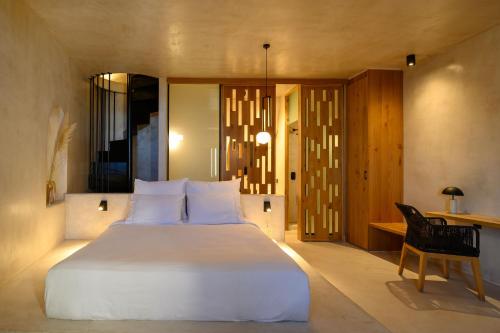 Voodi või voodid majutusasutuse Gaia Suites toas