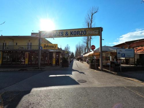 a street with a sign that reads koreaolis and koreaocal at Gosztonyi Villa in Siófok