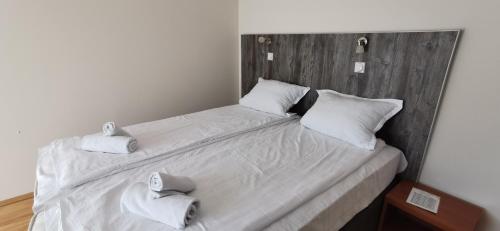 Posteľ alebo postele v izbe v ubytovaní Apartments Milsa Lux