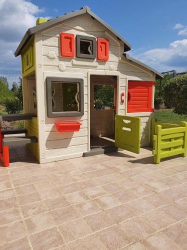 a toy house with a tv on top of it at Mas Saint Julien in Cavaillon