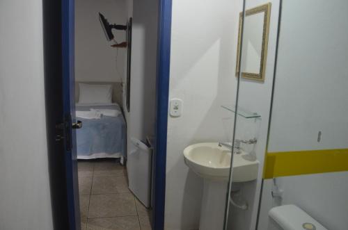 Ett badrum på Pousada Bicho do Mar