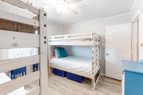 a bunk bed room with two bunk beds at Beachy Keen in Dauphin Island