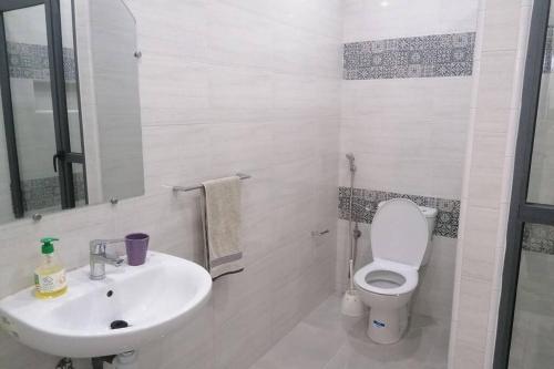 Ванная комната в Zak appartement (calme confortable et bien situé)
