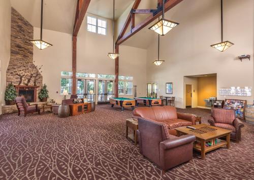 a large living room with couches and a table at WorldMark Windsor in Windsor