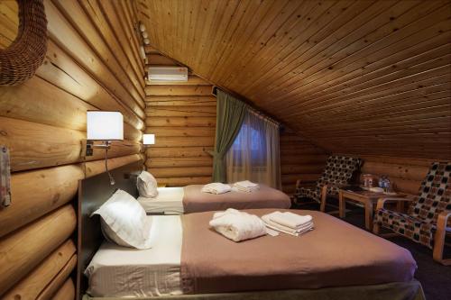 Кровать или кровати в номере Motel Slavyanka