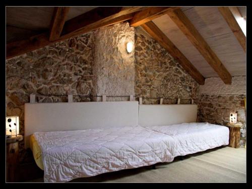 Katil atau katil-katil dalam bilik di Holiday Home Botanica
