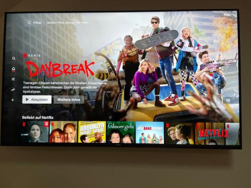 TV a/nebo společenská místnost v ubytování Jahn Apartments