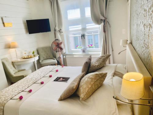 Voodi või voodid majutusasutuse The White Queen B&B toas