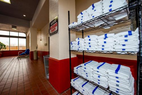 a store aisle with stacks of toilet paper at Quality Inn Colorado Springs South in Colorado Springs