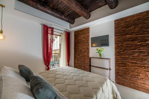 Кровать или кровати в номере Residenza San Gregorio Armeno
