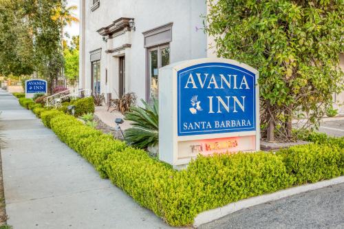 a sign for awana inn in front of a building at Avania Inn of Santa Barbara in Santa Barbara