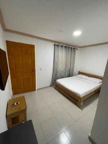 Cama o camas de una habitación en Posada Yasa sarie bay
