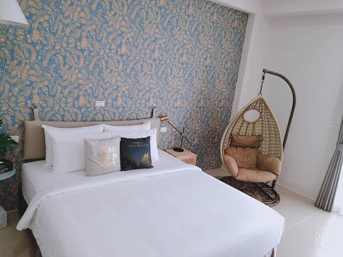禾旅宿Ho Hostel 墾丁夢幻島にあるベッド