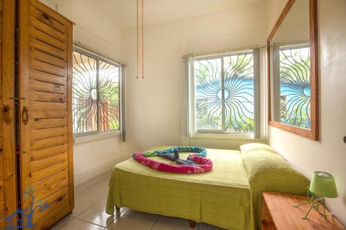 Ένα ή περισσότερα κρεβάτια σε δωμάτιο στο Casa Pan Dulce minutes away from town