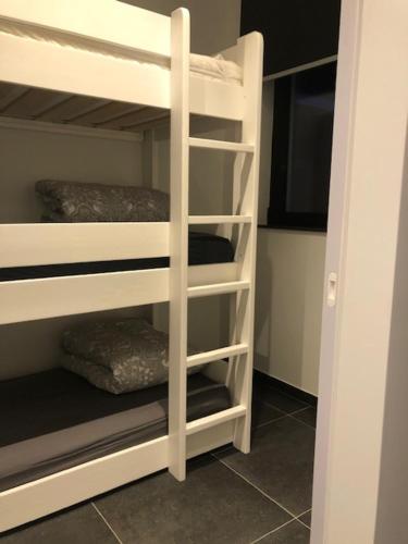 a white bunk bed in a room at BLOC79/TWO in Knokke-Heist