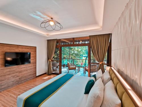 Postel nebo postele na pokoji v ubytování Loboc River Resort