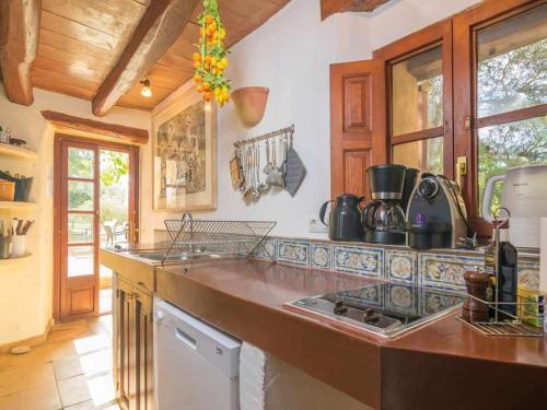 Kuchyň nebo kuchyňský kout v ubytování Finca Son Xona Alcina Vacation