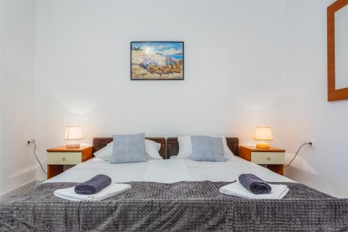 Postel nebo postele na pokoji v ubytování Apartment Mirela