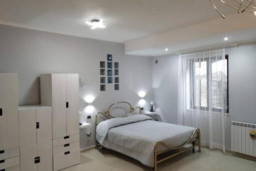 Voodi või voodid majutusasutuse IL RIFUGIO di Pozzano toas