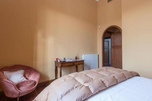 A bed or beds in a room at Vatican Luxury View