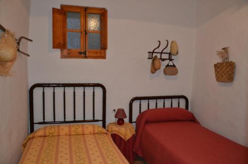 Giường trong phòng chung tại RCP El Racó