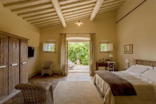 Giường trong phòng chung tại Casale Caterina Agriresort