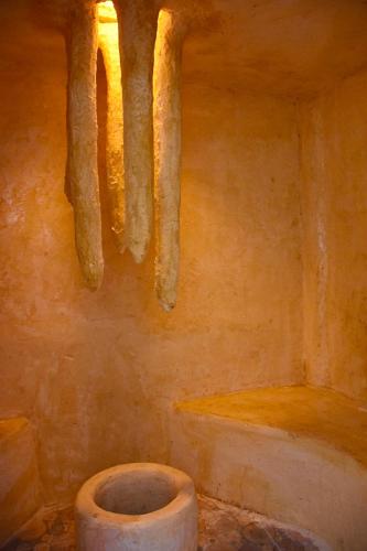 a dirty bathroom with a toilet and a tub at Ban Rai Jai Chaem - Spa Cafe & Homestay in Ban Rai