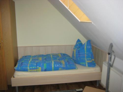 
Ein Bett oder Betten in einem Zimmer der Unterkunft Ferienwohnung "Lindenblick"
