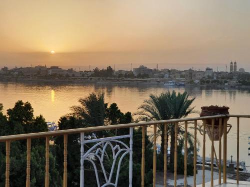 a view of a body of water at sunset at Spring Hotel Luxor in Luxor