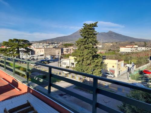 a view of a city from a balcony at Hotel De Rosa in Boscoreale