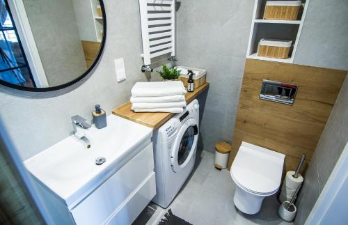 Kúpeľňa v ubytovaní Apartamenty W37