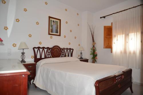 A bed or beds in a room at Casa Pili