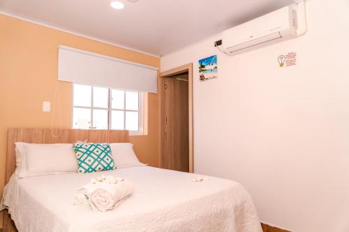 Postel nebo postele na pokoji v ubytování Summer Breeze
